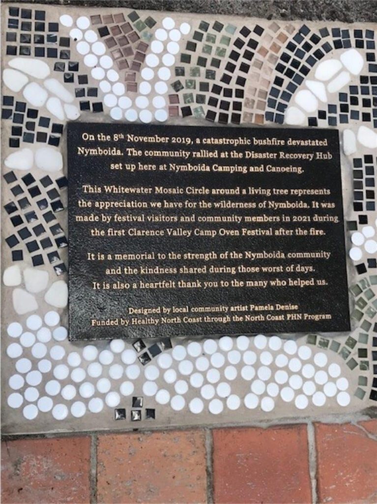 Image of mosaic design and commemorative plaque.