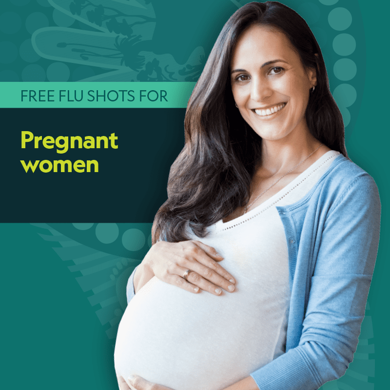 Pregnant woman smiling at camera